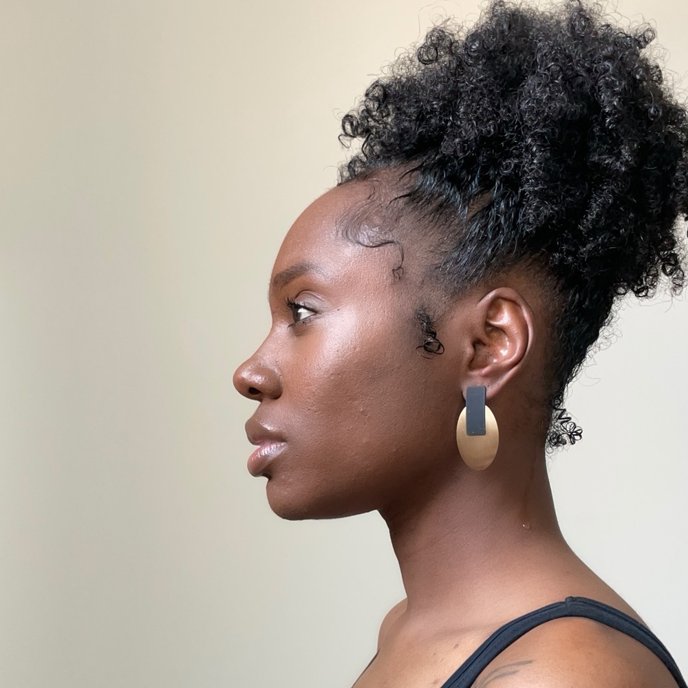 Contemporary style gold and black stud earrings